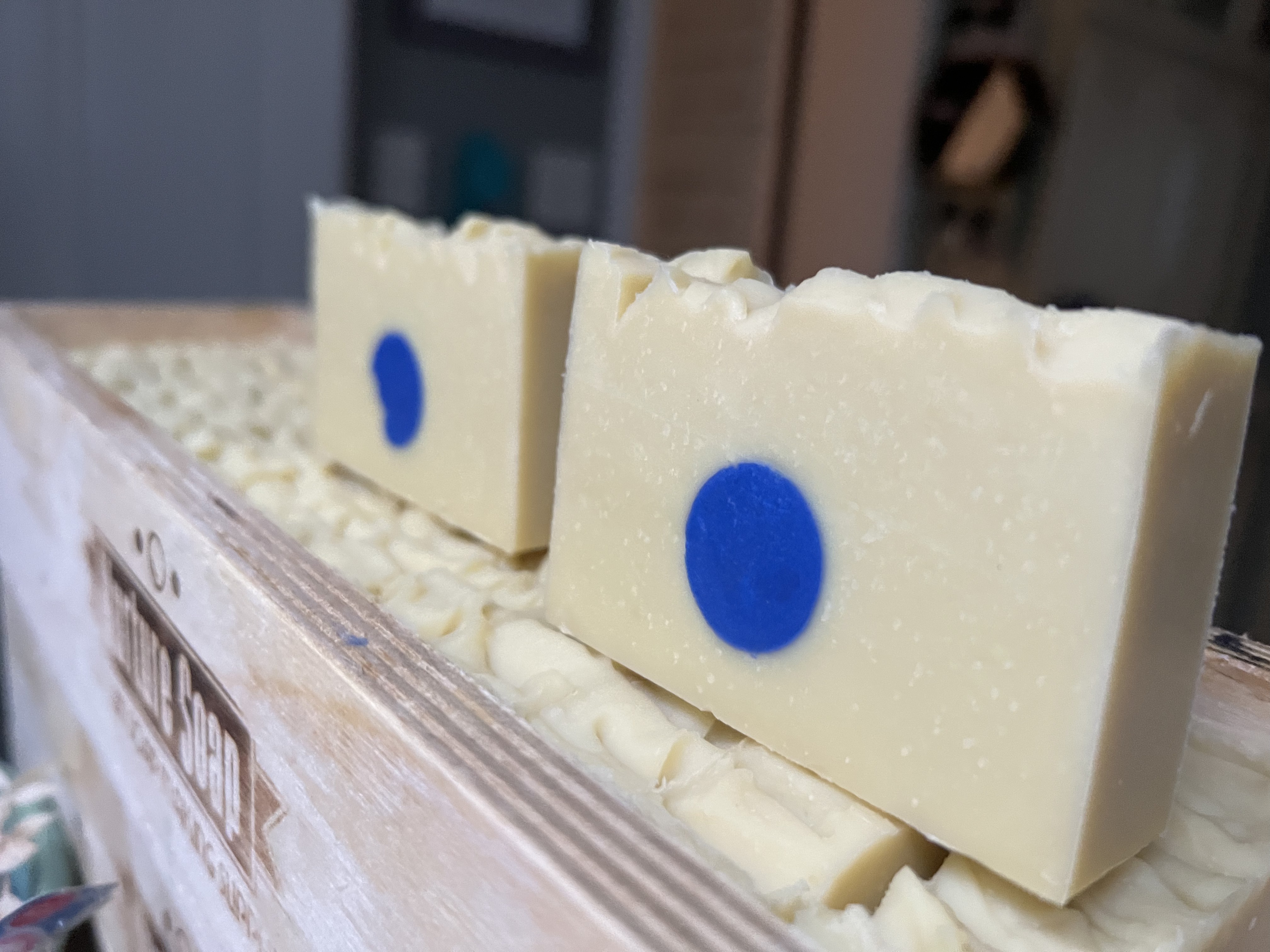 Handmade MK Soap bars in a wooden MK Soap crate