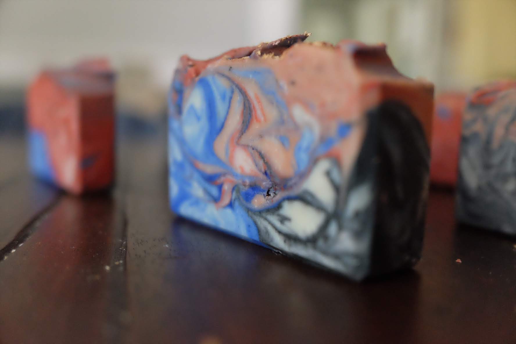 Red, blue and black marbled soap bars